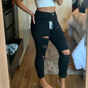 New ripped skinny black jeans